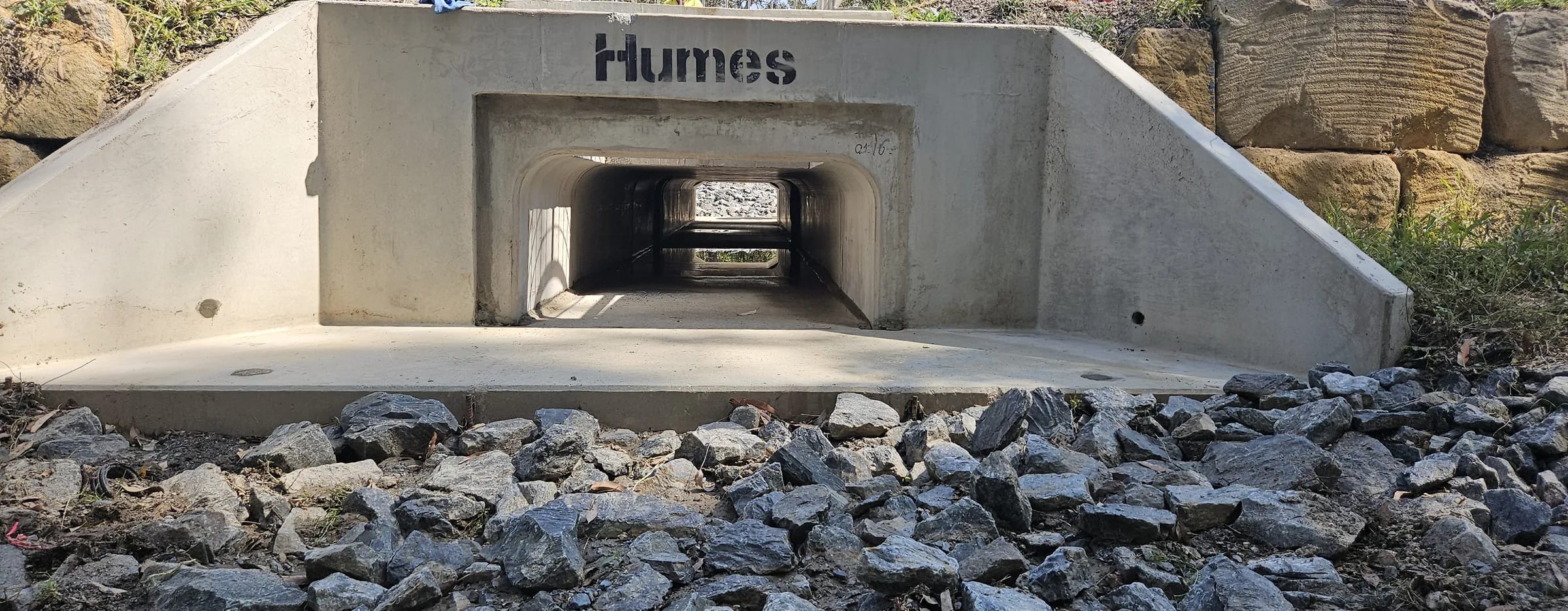 Precast box-culvert headwall with rock scour protection